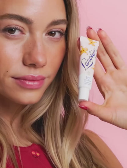 Video of model using and applying the new Lanolips 101 Ointment Multi-Balm Gingerbread, infused with hydrating lanolin, vitamin-e and warm spice. 