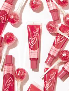 Lanolips' Glossy Balm Candy a fruity pink tint with added gold flecks for the ultimate glossy tint