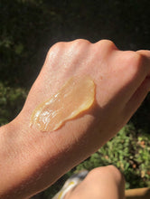 Load image into Gallery viewer, Golden Dry Skin Miracle Salve on Skin on Hand
